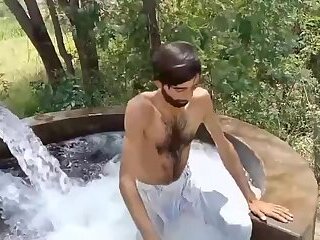 Slim hairy Paki have fun in tubewell